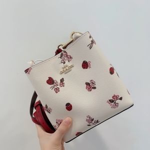 BNWT Coach mini town bucket bag with ladybug floral print crossbody bag shoulder
